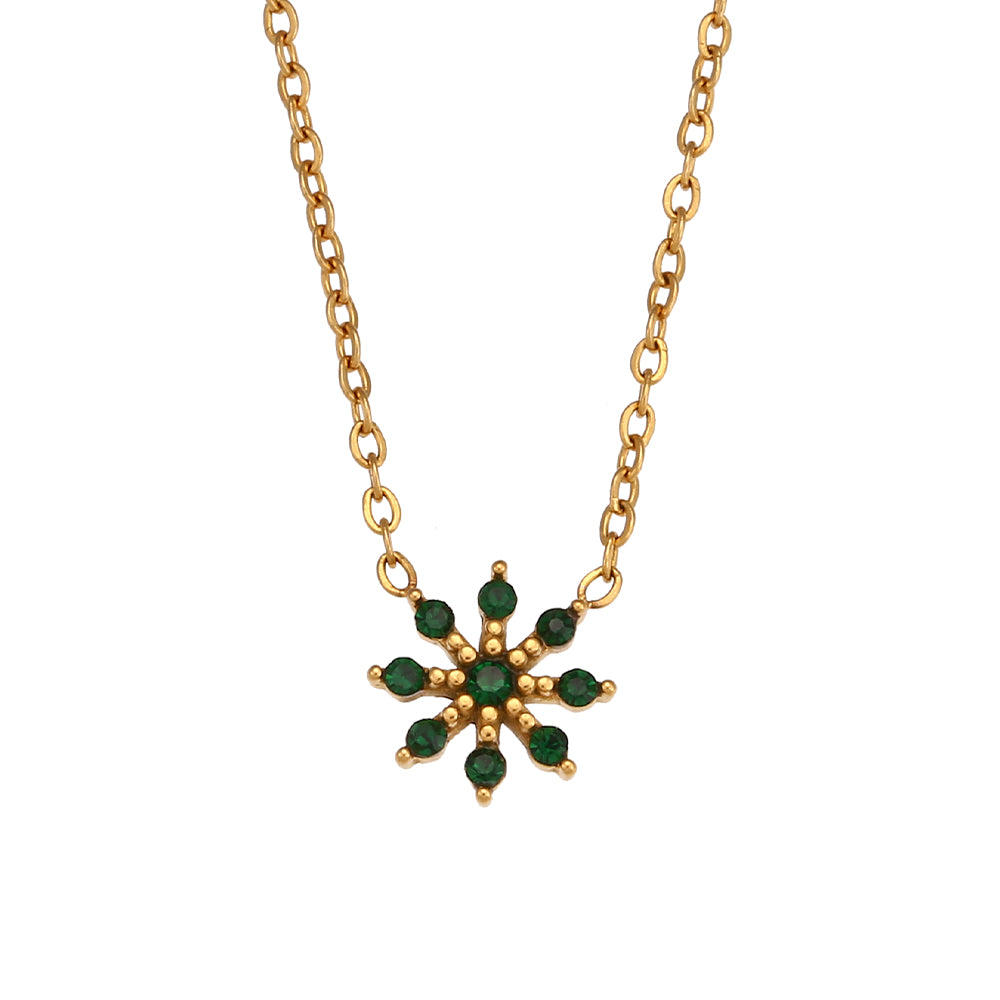 Close-up of Flori Green Necklace, a gold necklace statement piece with an adjustable fit and elegant design.