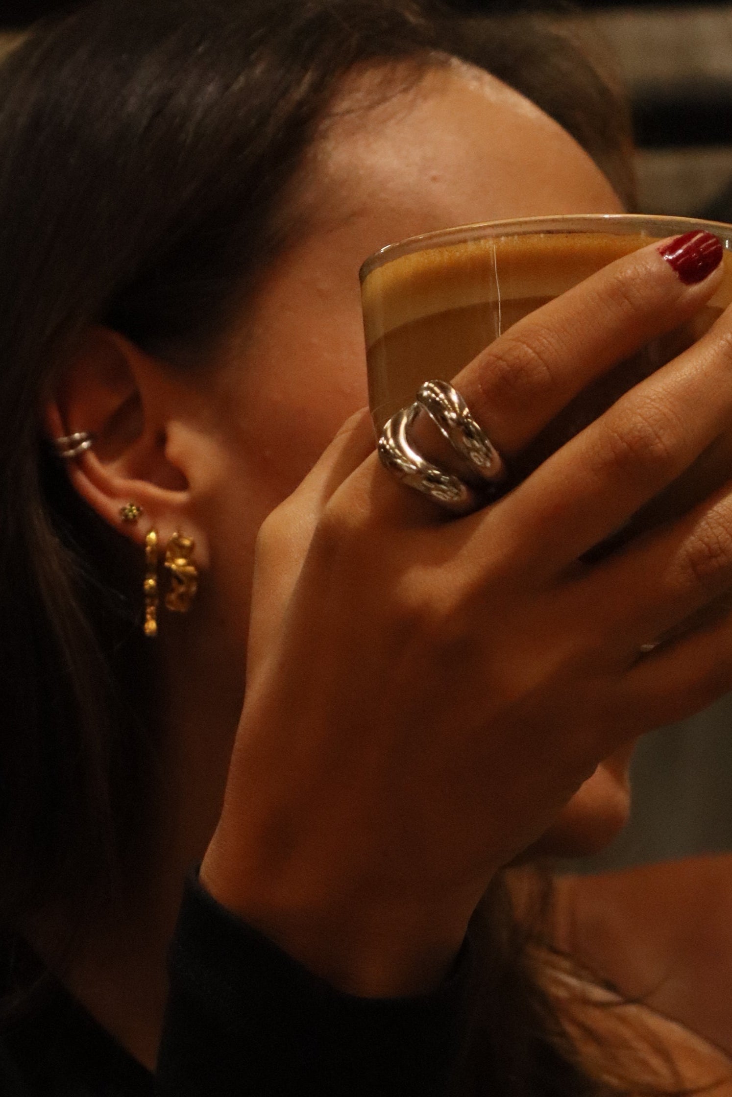 Maxi Ring – Silver PVD Plated Stainless Steel – Styled on Model With Mila Giraldo Studs and Ear Cuffs – Organic Sculptural Statement Ring in Lifestyle Shot – Mila Giraldo Jewellery Australia