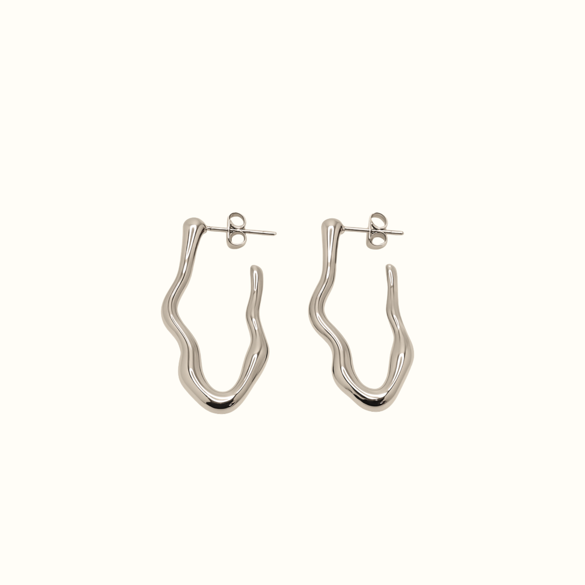 Wave Stud Earrings – Silver PVD Plated Stainless Steel – Close-Up of Curved Wave-Inspired Studs With Sculptural Minimalist Silhouette – Modern Everyday Jewellery by Mila Giraldo Australia