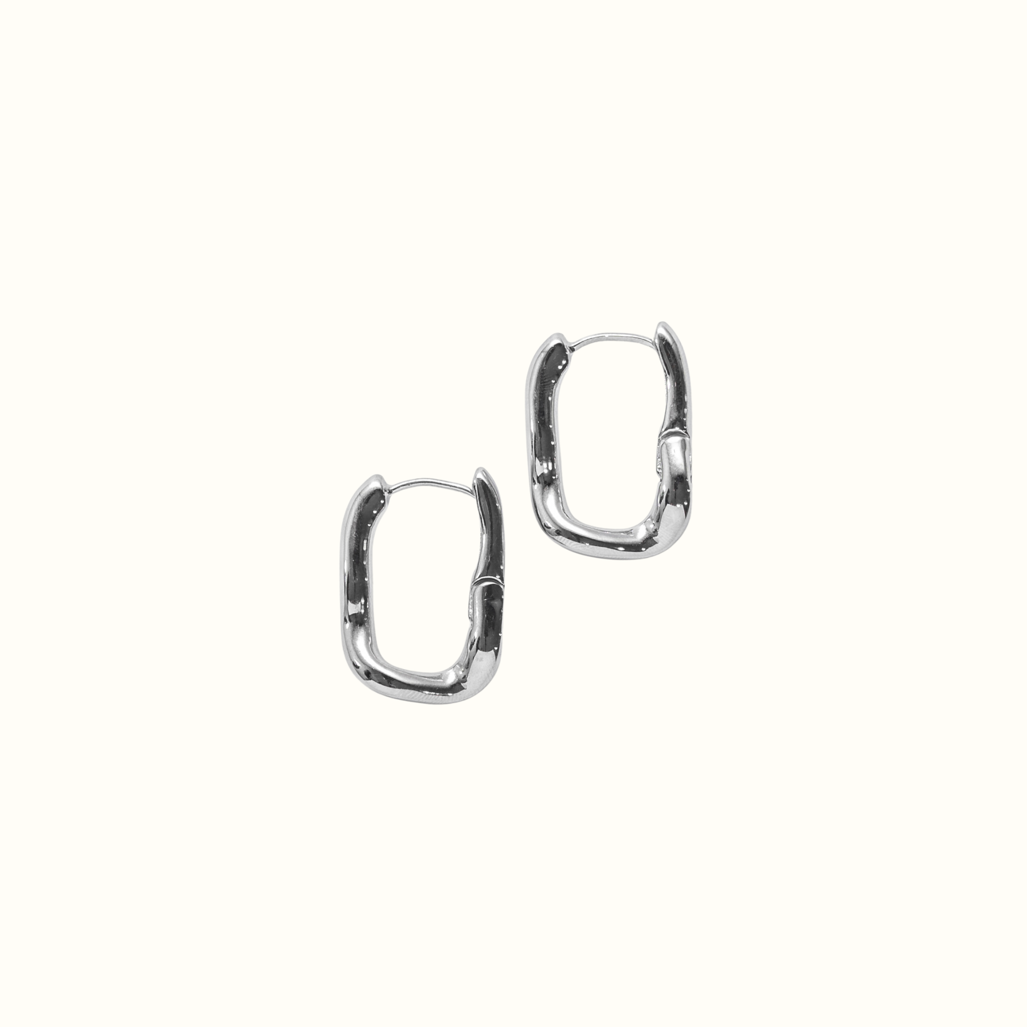 Wavy Square Hoop Earrings – Silver PVD Plated Stainless Steel – Sculptural Wavy Square Silhouette Close-Up – Modern Minimalist Hoop Design – Mila Giraldo Jewellery Australia