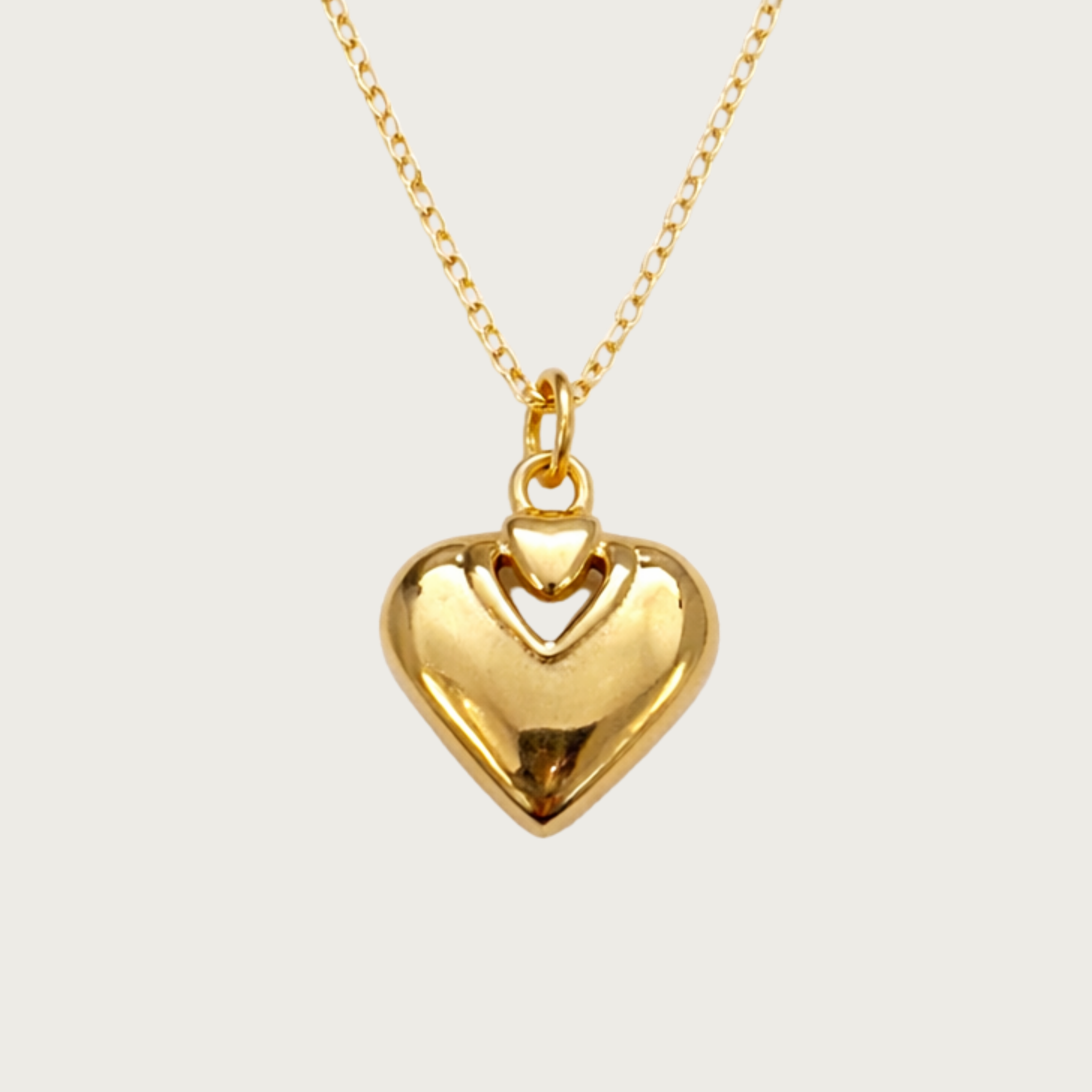 Gold heart-shaped pendant necklace
