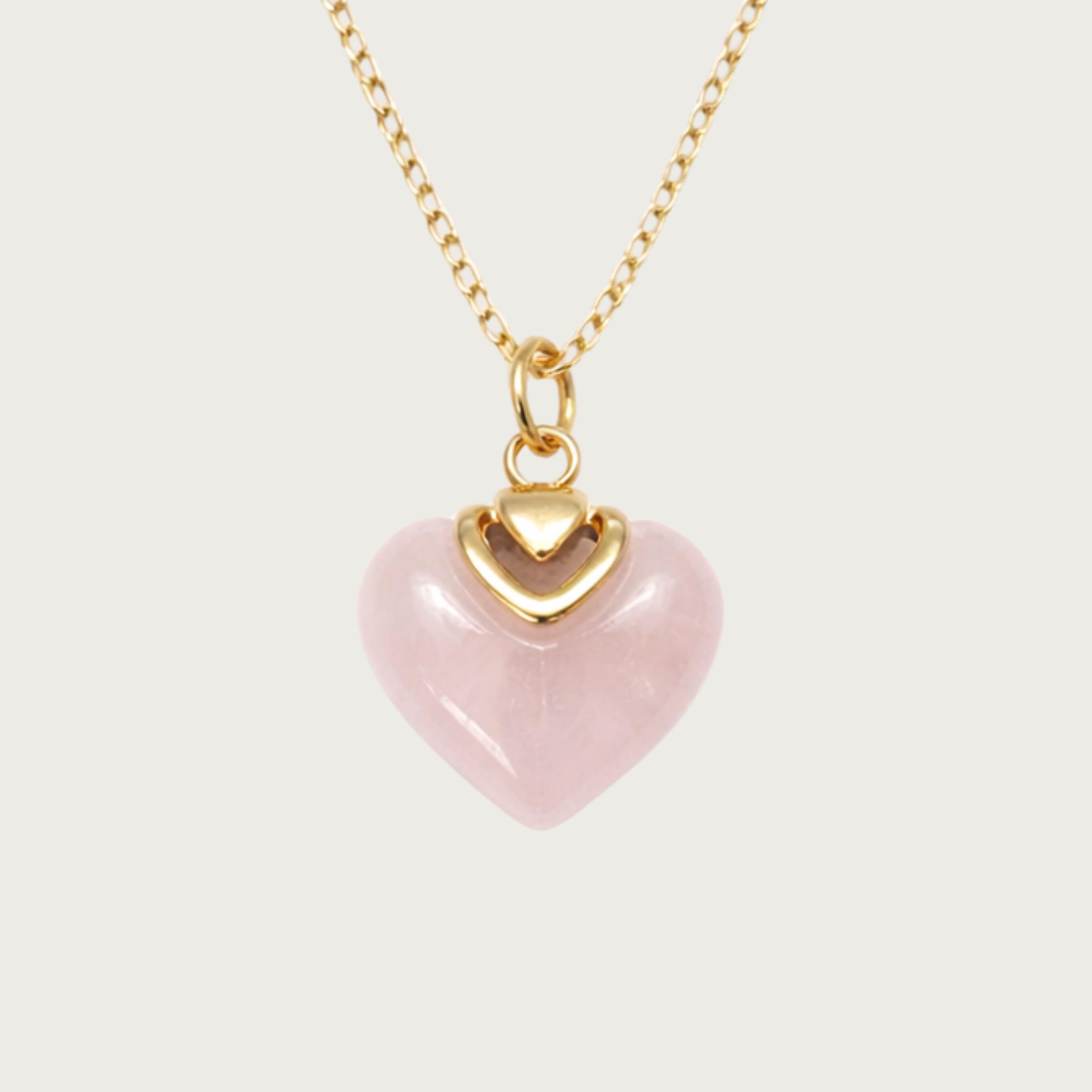 Necklace with a pink heart-shaped pendant