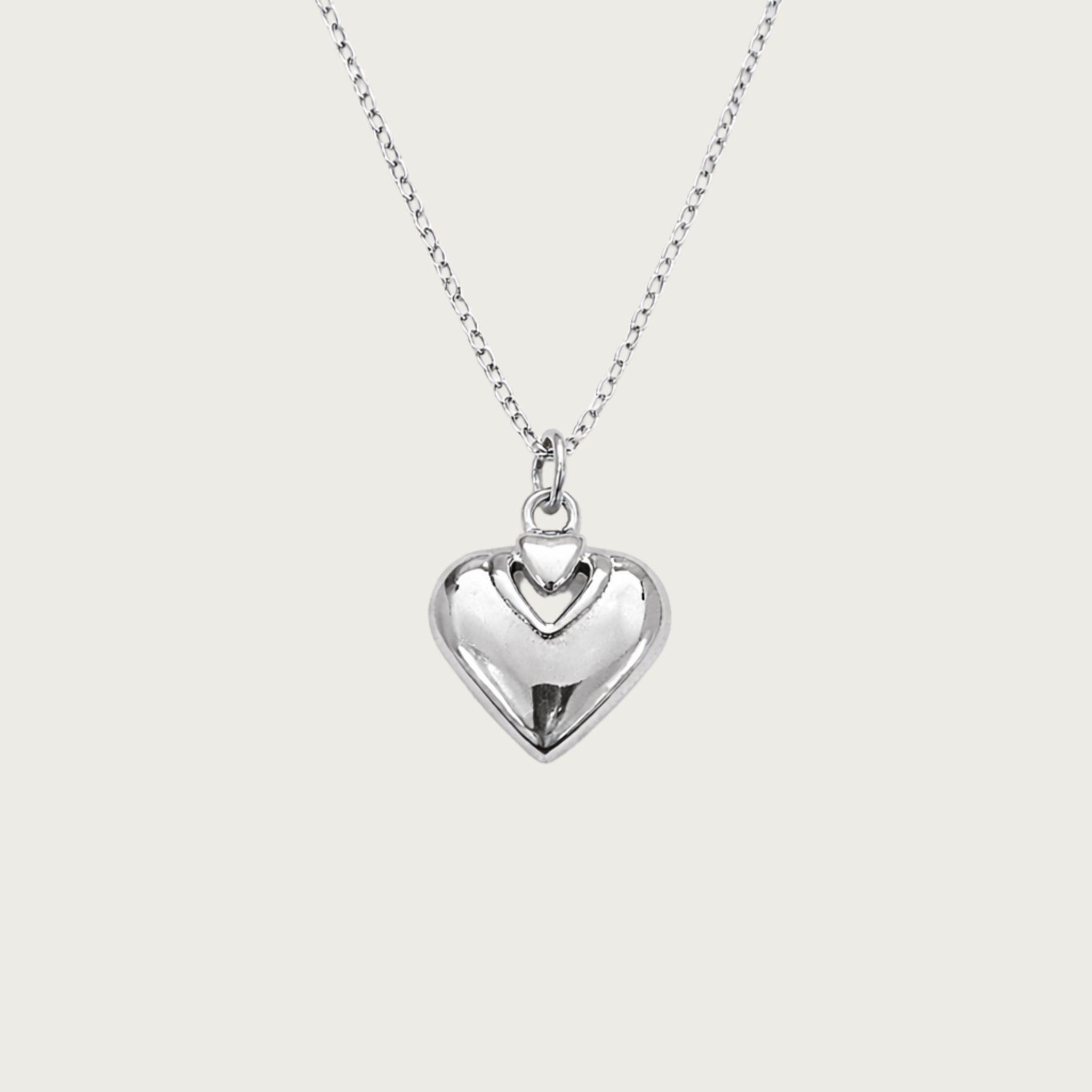 Silver heart-shaped pendant