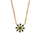 Close-up of Flori Green Necklace, a gold necklace statement piece with an adjustable fit and elegant design.