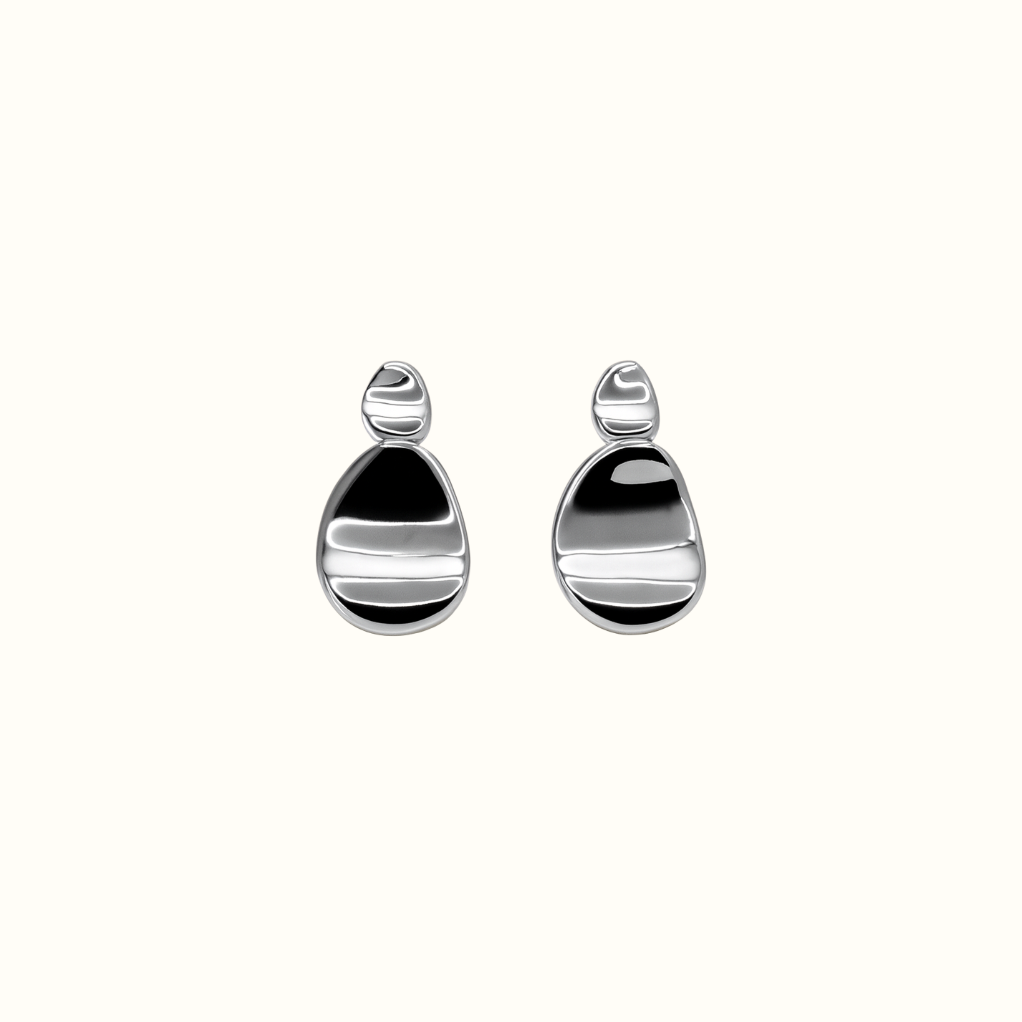 Click Stud Earrings – Silver PVD Plated Stainless Steel – Close-Up Showing Sleek Sculptural Stud Design With Clean Lines and Modern Minimalist Finish – Mila Giraldo Jewellery Australia