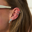 Model wearing Silver Mini Maria Stud Earrings styled with sculptural ear cuffs, showcasing a polished minimalist ear stack and modern everyday jewellery by Mila Giraldo.