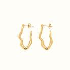 Wave Stud Earrings – 18k Gold PVD Plated Stainless Steel – Close-Up of Curved Wave-Inspired Studs With Sculptural Minimalist Silhouette – Modern Everyday Jewellery by Mila Giraldo Australia